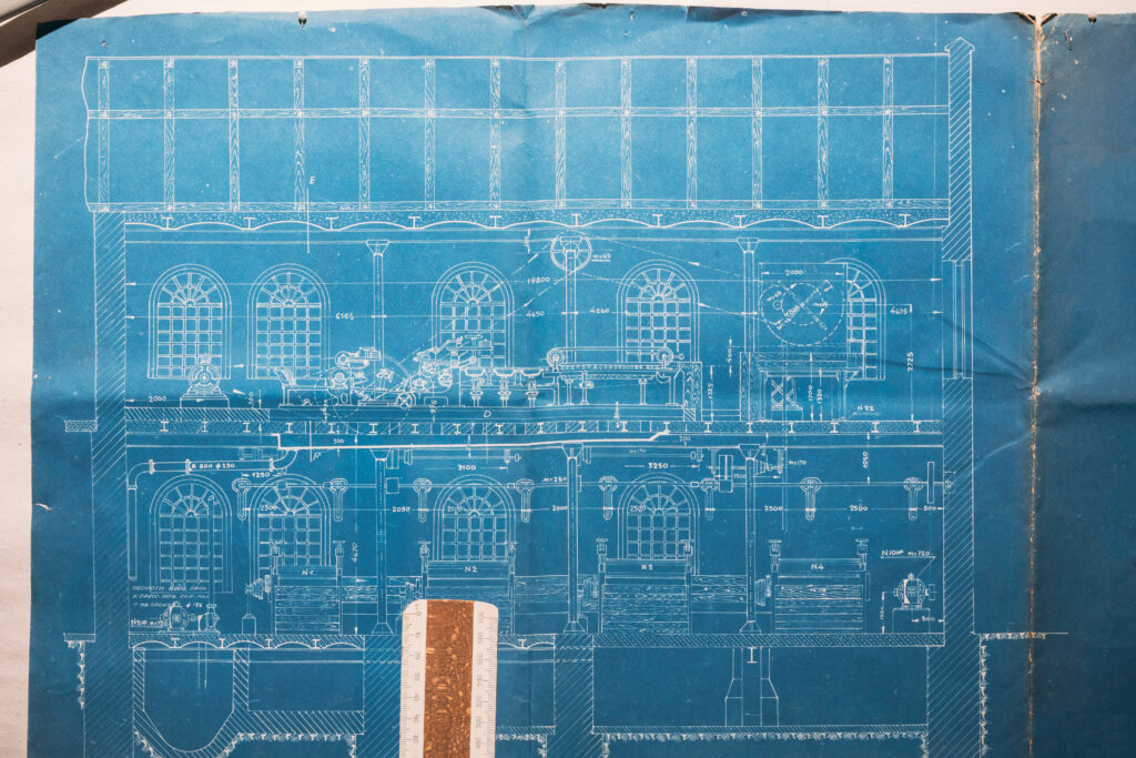 Detailed old drawing of a paper mill, emphasizing the importance of compliance and precision in integrating modern electronic locking systems.