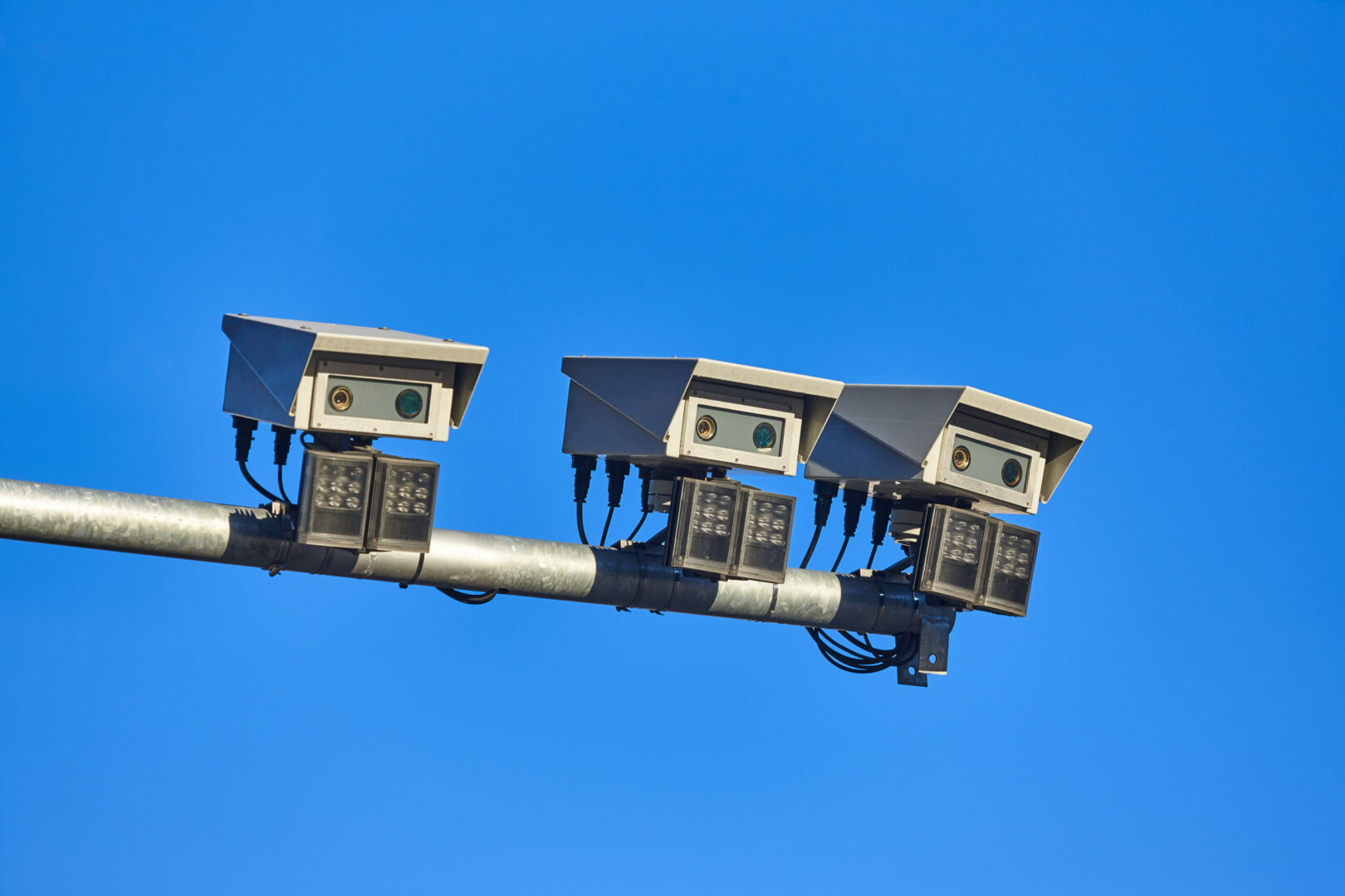 Urban traffic control surveillance camera, illustrating its role in a big data city monitoring system for enhanced traffic management and safety.